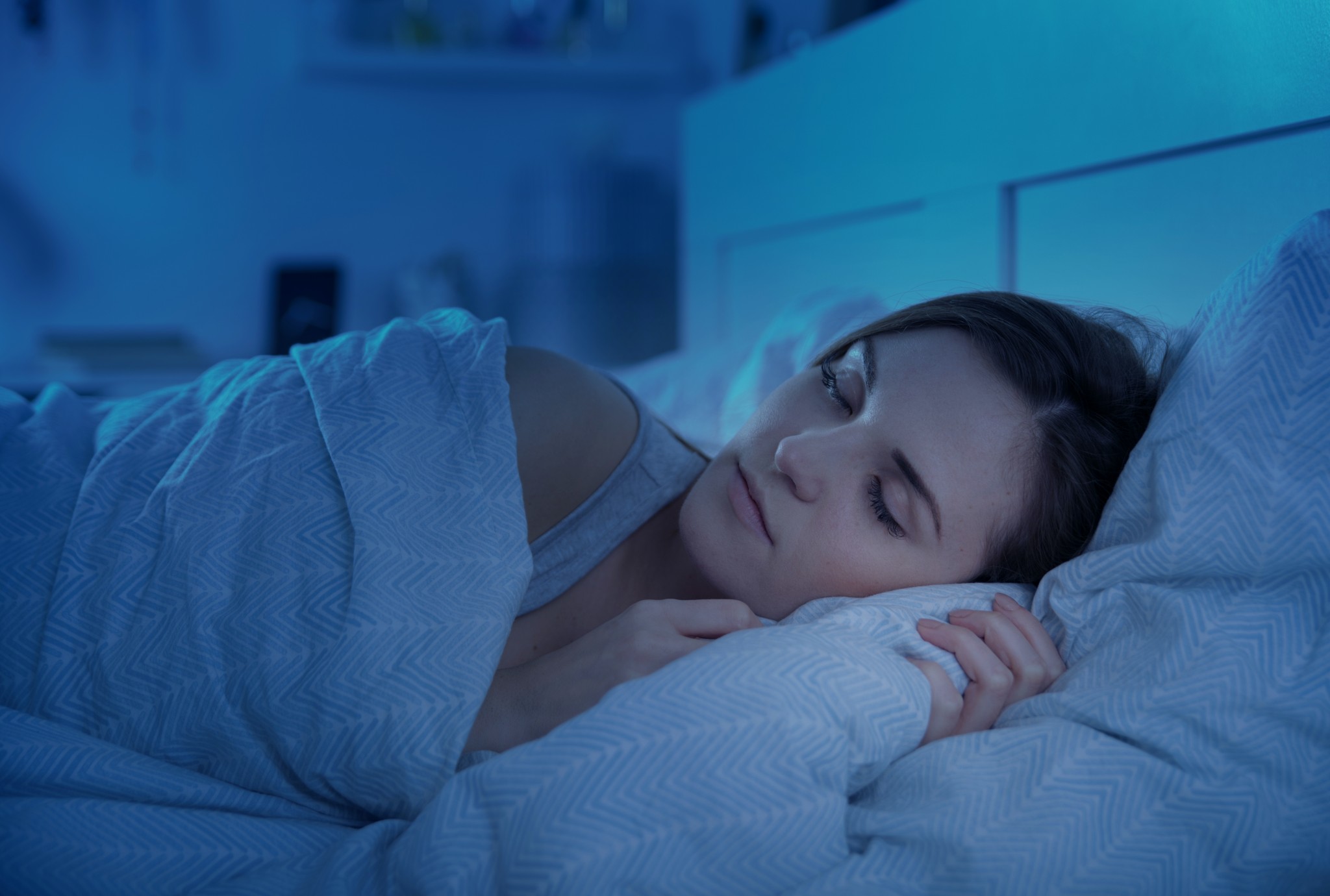 girl-peacefully-sleeping-in-bed-at-night-divorce-hub