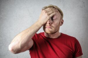 Divorce stressed man holding his head