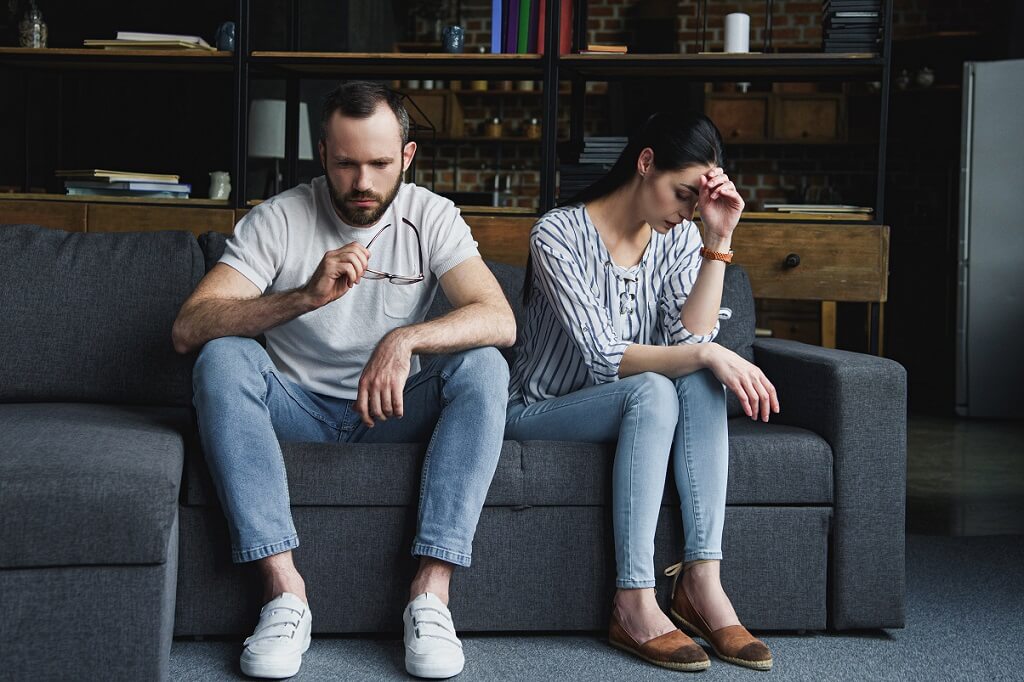 Sad couple need to adjust to life after divorce