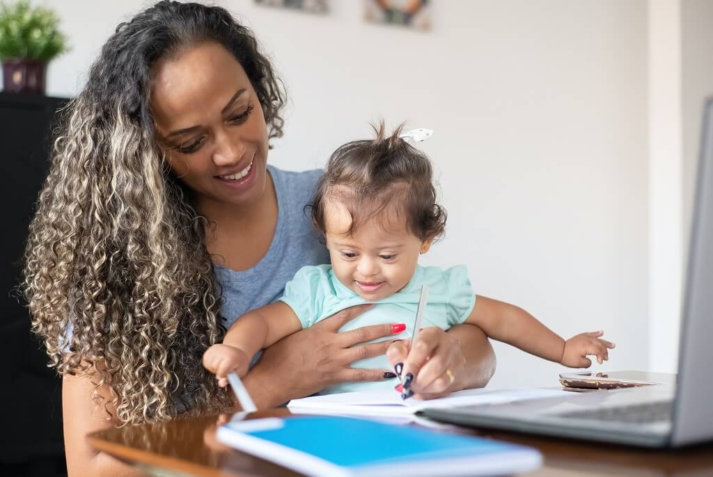 Woman with her child, able to move on with financial security after divorce