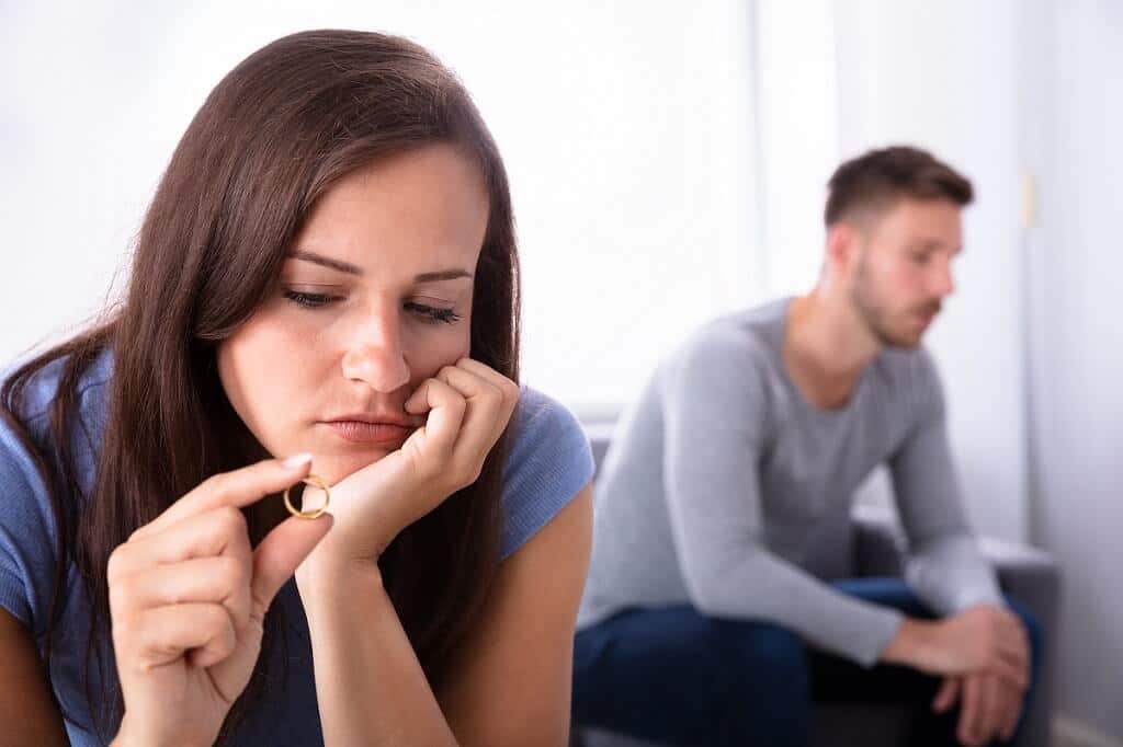 Sad couple facing divorce - no fault divorce doesn't mean no stress divorce